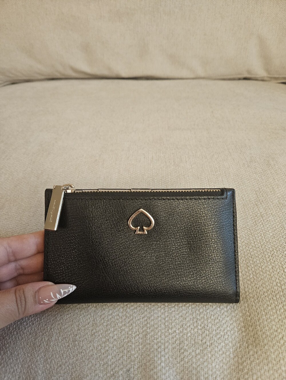 kate spade black leather zip card case with heart charm